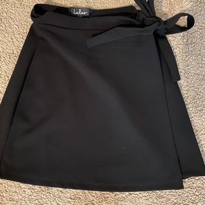 Black wrap mini skirt